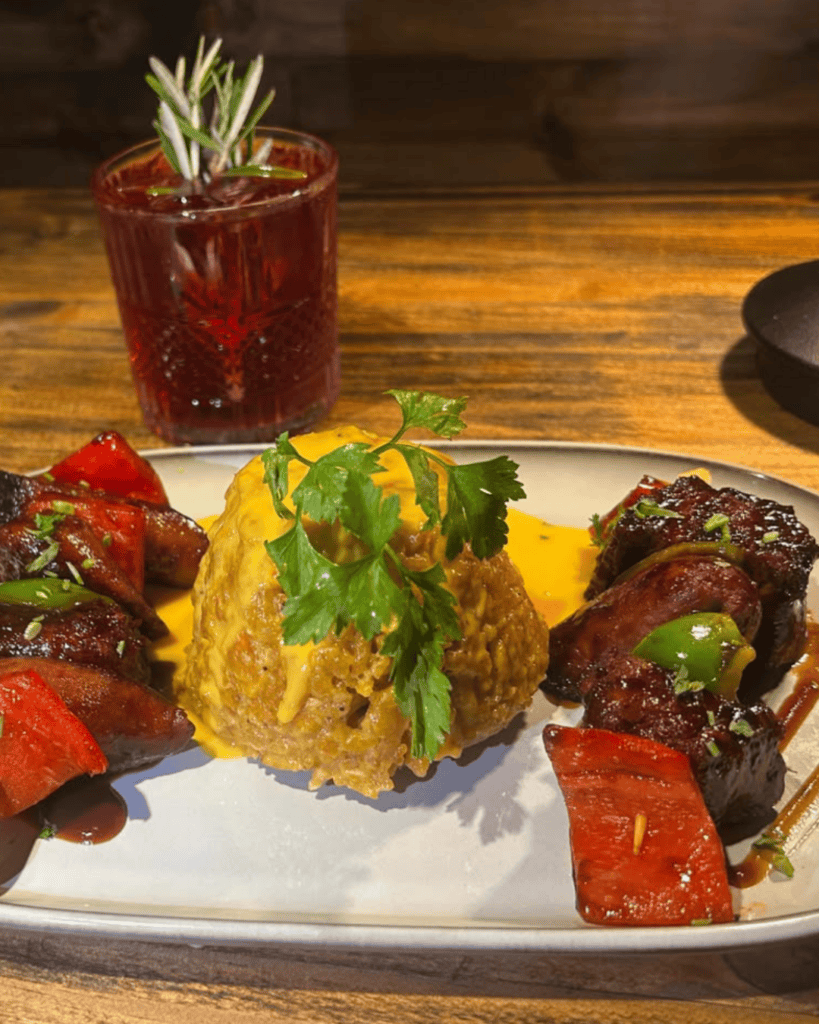 Plant-based Dominican comfort food plate at Next Stop Vegan in Brooklyn Heights, Brooklyn