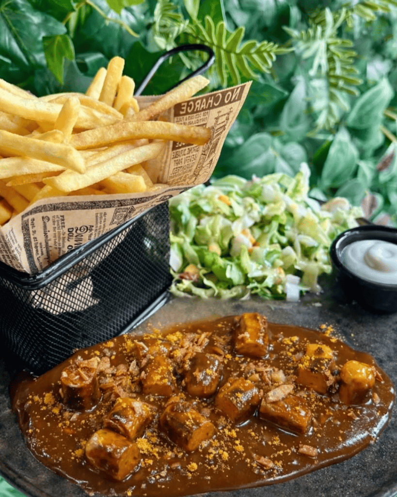 Vegan Joy Burger and fries at Reed, a 100% plant-based comfort food restaurant in Luxembourg City