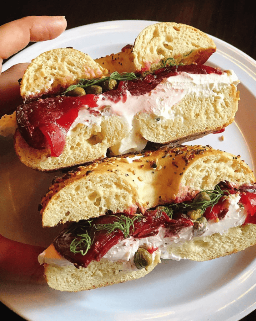 Fresh-baked vegan bagel sandwich and locally roasted coffee at Familiars vegan coffee shop in Bed-Stuy, Brooklyn