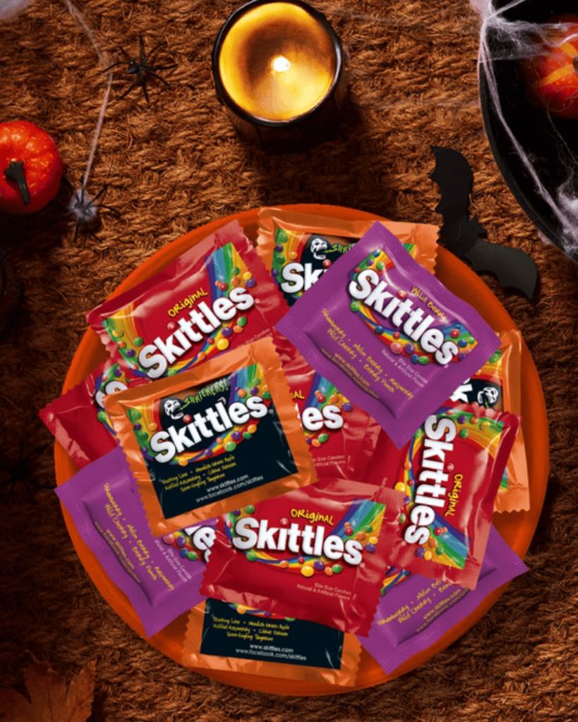 Skittles Halloween fun size bag, an easy vegan Halloween candy for the bowl